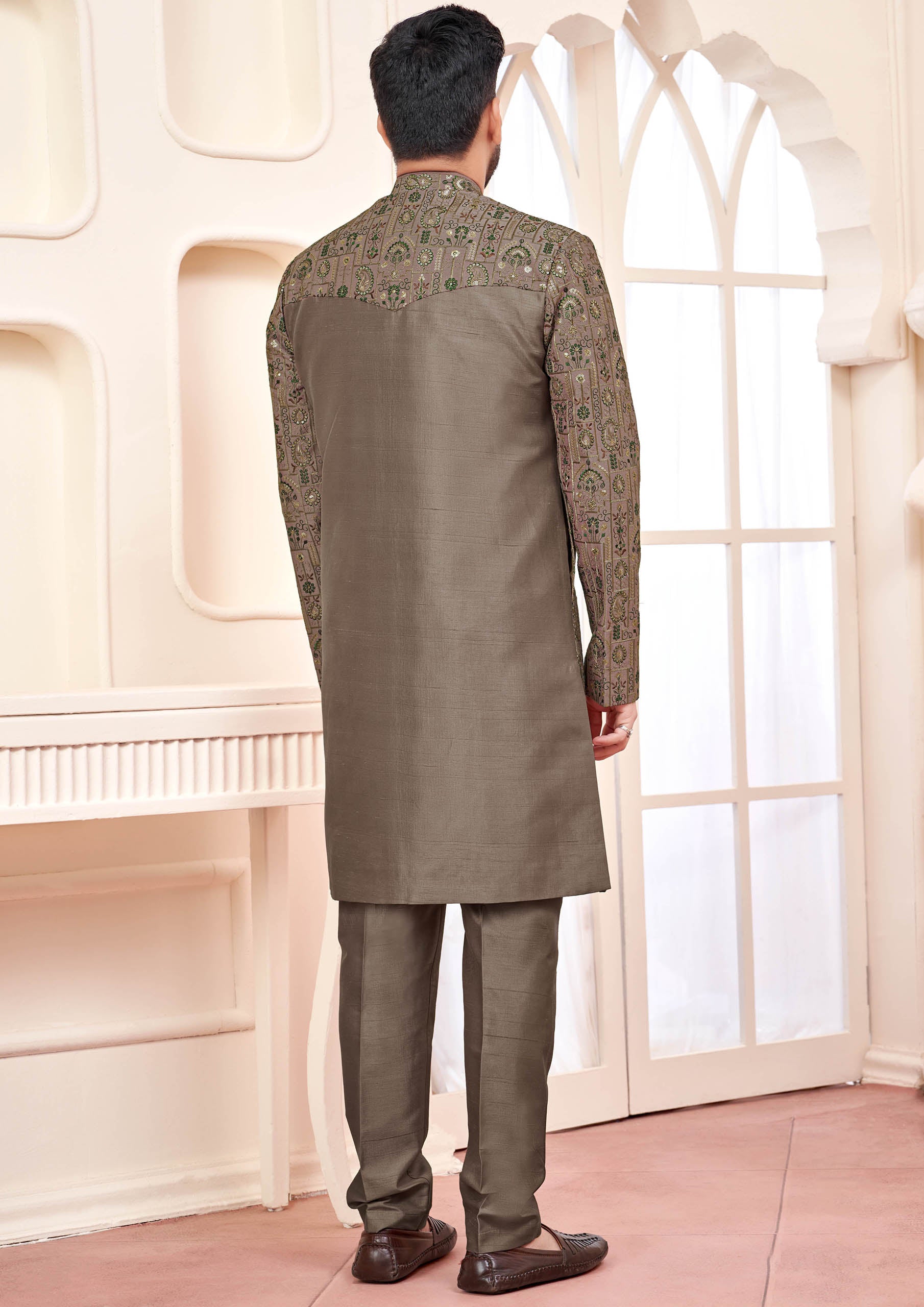 Stylish brown silk embroidered sherwani, showcasing fine craftsmanship, suitable for festive and ceremonial attire